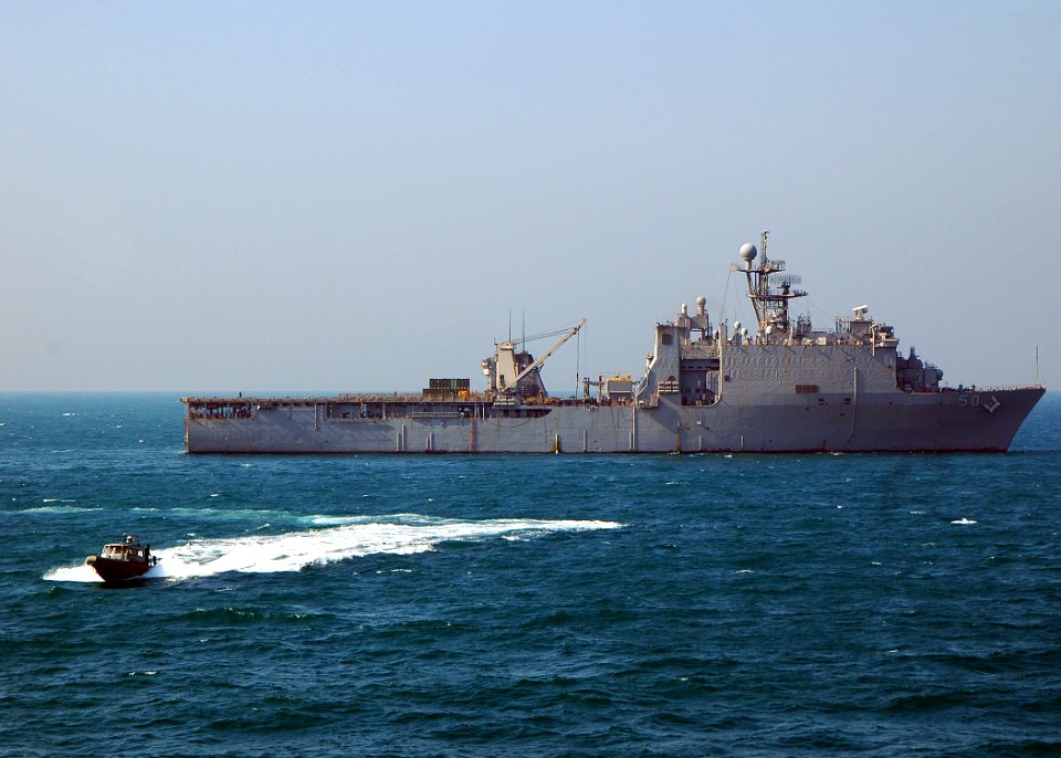 US Navy 090114-N-5681S-045 A rigid-hull inflatable boat from USS Ramage (DDG 61) approaches USS Iwo Jima (LHD 7)