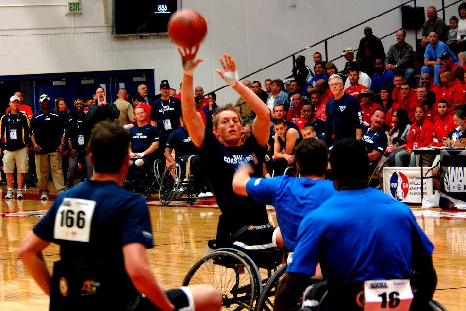 US Navy 110520-N-CD297-167 Parachute Rigger 3rd Class Michael Johnston, a member of Team Navy-Coast Guard, attempts to make a field goal