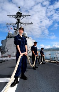 US Navy 090112-N-0879R-003 Sailors aboard USS Chafee (DDG 90) stow a mooring line
