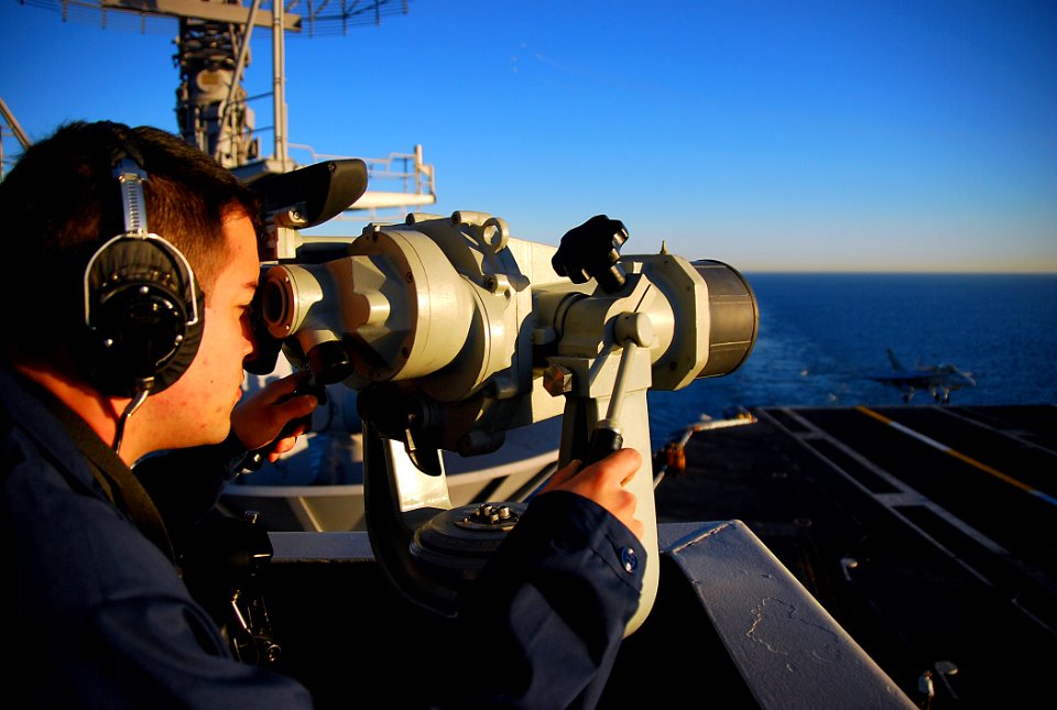 US Navy 090117-N-6597H-146 Boatswain's Mate Seaman Apprentice Nick Meyers stands the port forward lookout watch during flight operations aboard the aircraft carrier USS John C. Stennis (CVN 74)