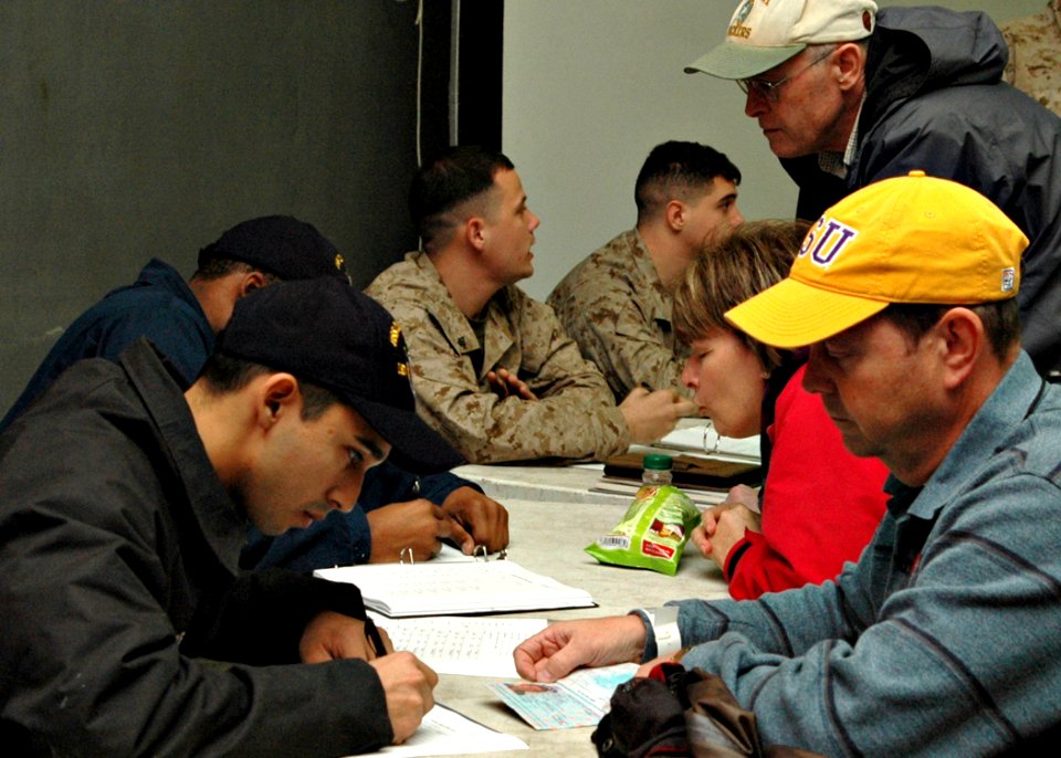 US Navy 090119-N-9134V-029 Sailors and Marines account for evacuees during a non-combatant evacuation operation exercise
