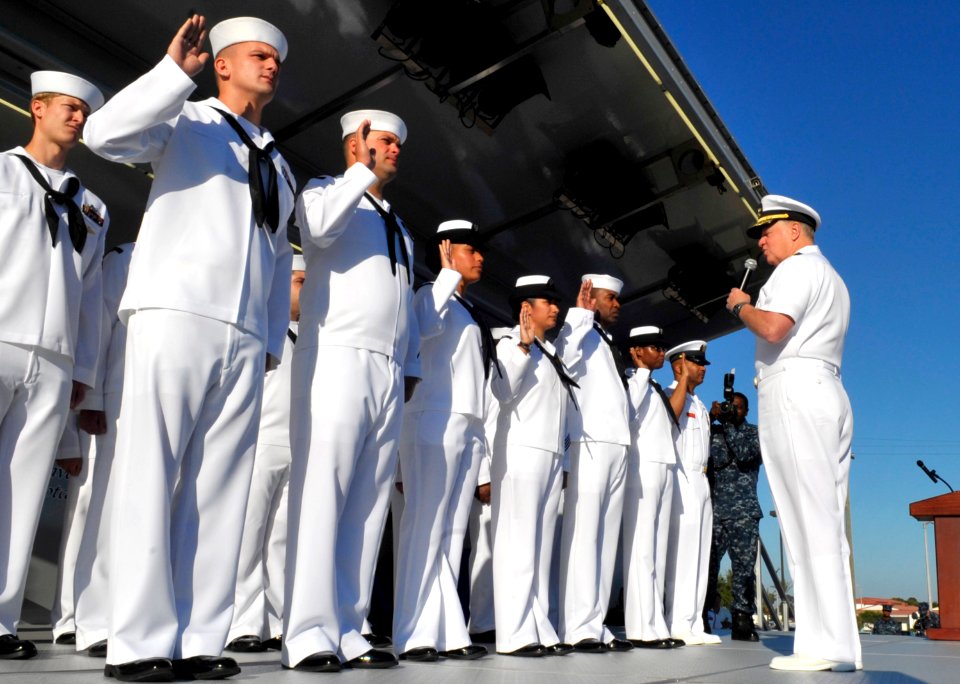 US Navy 110524-N-ZB612-026 Chief of Naval Operations (CNO) Adm. Gary Roughead reenlists seven Sailors during an all-hands call