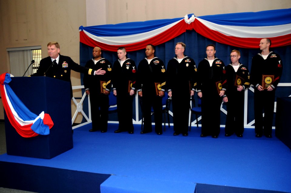 US Navy 090116-N-7526R-016 Rear Adm. David Mercer congratulates seven Sailor of the Year candidates during a ceremony at Naval Support Activity Naples