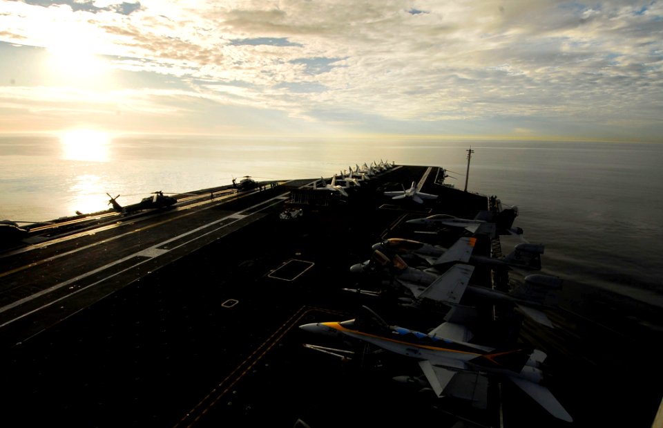 US Navy 090120-N-6538W-215 The aircraft carrier USS John C. Stennis (CVN 74) steams through the Pacific Ocean during a sunrise photographic exercise