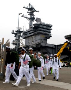 US Navy 110615-N-MD252-557 Sailors come ashore after returning to Naval Base Coronado