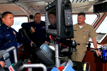 US Navy 090115-N-9818V-055 Coast Guard Master Chief Boatswain's Mate Bill James gives Master Chief of the Coast Guard Skip Bowen and Master Chief Petty Officer of the Navy (MCPON) Rick West a tour of USCG Sea Horse (WPB 87361)