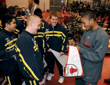 US Navy 090121-N-8848T-928 Chicago Bulls guard Derrick Rose signs autographs for a group of Chicago-area recruits at the Chicago Bulls Berto Center practice facility