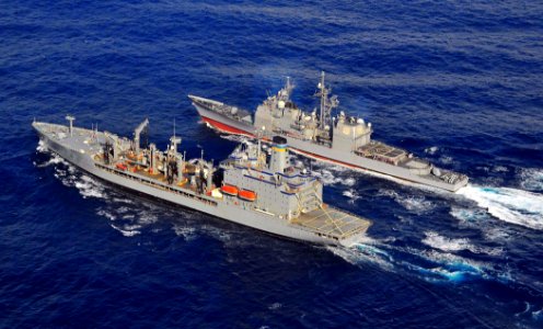 US Navy 090124-N-4774B-047 The guided-missile cruiser USS Lake Champlain (CG 57), right, pulls alongside the Military Sealift Command fleet replenishment oiler USNS John Ericsson (T-AO 194)