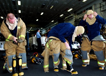 US Navy 090119-N-5681S-131 Sailors participate in a Damage Control Olympics event aboard the multi-purpose amphibious assault ship USS Iwo Jima (LHD 7)