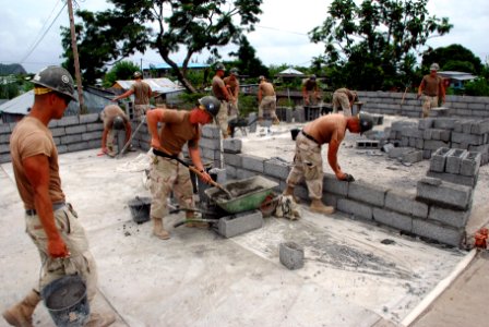 US Navy 090123-N-1540F-010 Seabees continue construction of a six-classroom schoolhouse in Moroni
