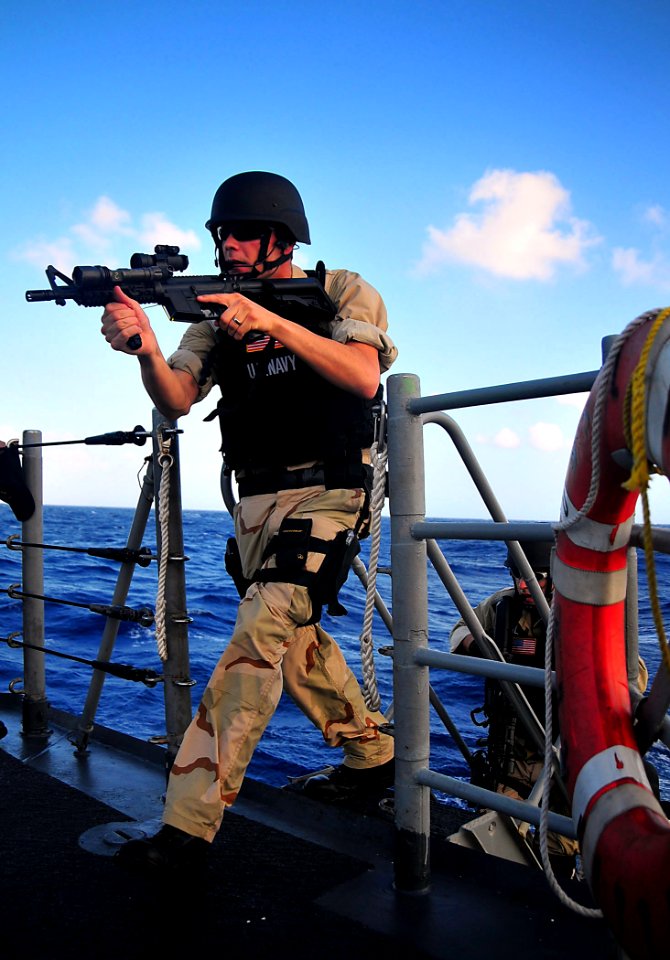 US Navy 090127-N-4774B-034 Sailors aboard the guided-missile cruiser USS Lake Champlain (CG 57) rehearse procedures during a visit, board, search, and seizure exercise