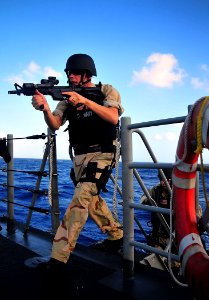 US Navy 090127-N-4774B-034 Sailors aboard the guided-missile cruiser USS Lake Champlain (CG 57) rehearse procedures during a visit, board, search, and seizure exercise photo