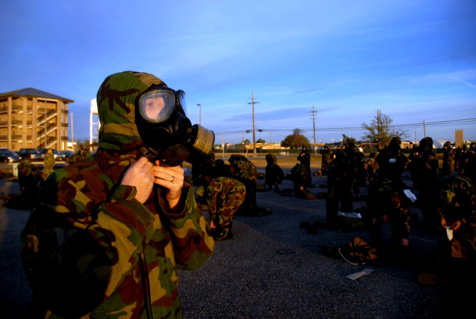 US Navy 090123-N-3674H-086 Lt. Mark Christensen, assigned to Naval Mobile Construction Battalion (NMCB) 74, dons protective equipment