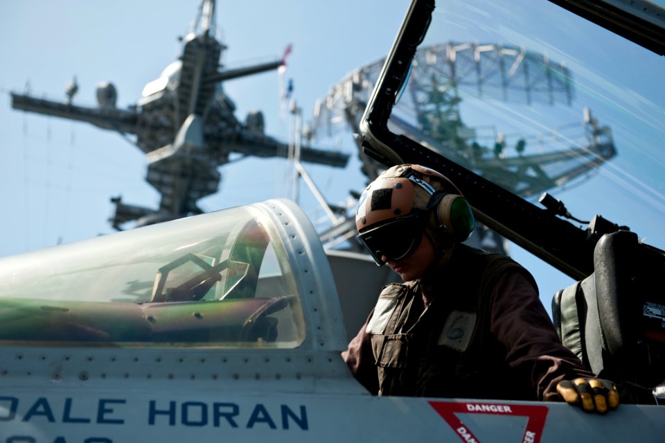 US Navy 110729-N-BT887-043 Aviation Ordnanceman Airman Elizabeth Clark performs a post-flight inspection aboard USS John C. Stennis (CVN 74)