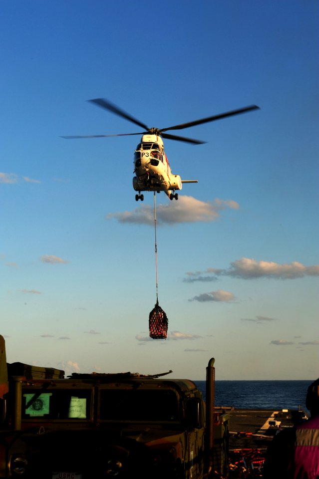 US Navy 110725-N-WA347-001 A 330J Puma helicopter delivers supplies aboard USS Germantown (LSD 42)