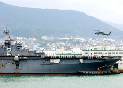 US Navy 090123-N-0120A-001 An MH-60S Sea Hawk helicopter assigned to The Island Knights of Helicopter Sea Combat Squadron (HSC) 25 lands aboard the amphibious assault ship USS Essex (LHD 2)