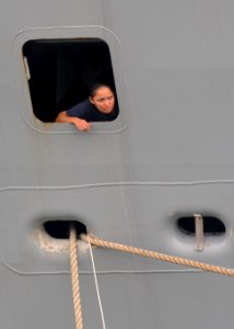 US Navy 110818-N-XG305-255 BM2 Francine Garcia watches line handlers from the aft mooring station