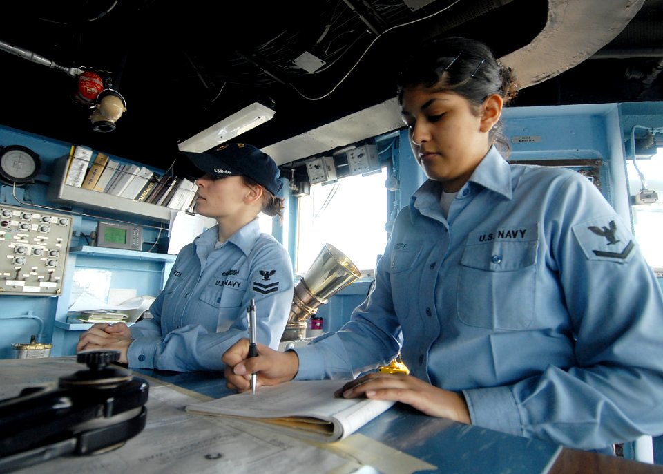 US Navy 090127-N-6936D-004 Quartermaster 3rd Class Crystal Arizpe, from Rupert, Idaho, assigned to the forward-deployed dock landing ship USS Tortuga (LSD 46), records bearings in the bearing log