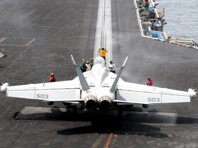US Navy 110906-N-QL471-175 Sailors perform pre-launch checks on an EA-18G growler