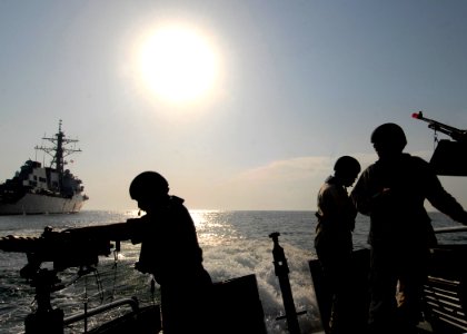 US Navy 090130-N-3392P-033 Sailors conduct small boat operations near the guided-missile destroyer USS Ramage (DDG 61)