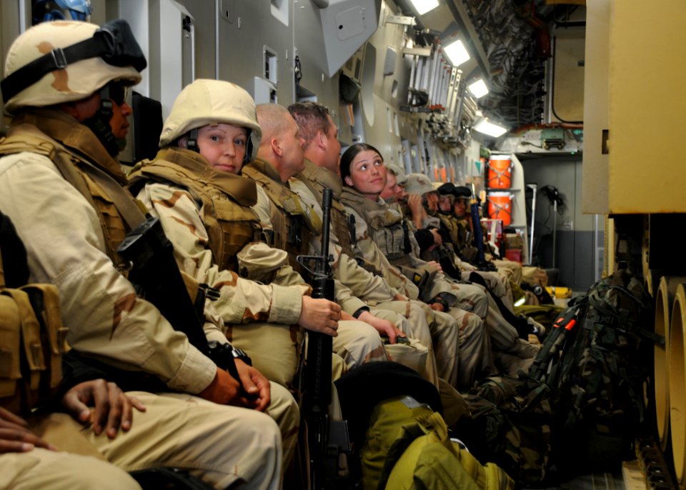 US Navy 090128-N-1120L-104 Seabees prepare to depart an Air Force C-17 aircraft