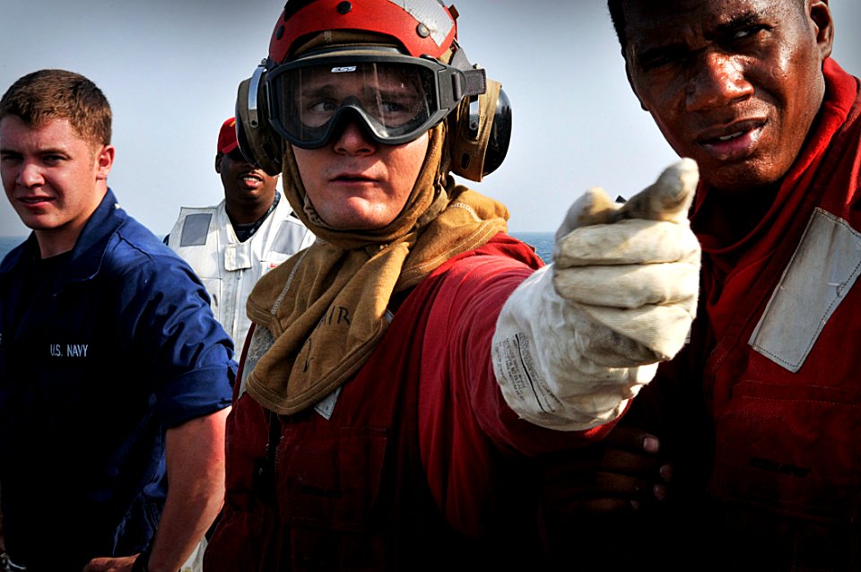 US Navy 110819-N-AG285-222 Sailors respond to a simulated aircraft fire during a training exercise