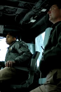 US Navy 090203-N-1512O-087 Capt. Sam Howard and Capt. Kris Croeber oversee preparations before going to sea