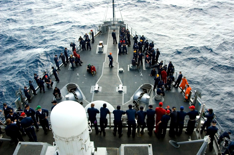 US Navy 090202-N-1251W-022 Sailors assigned to the amphibious dock landing ship USS Harpers Ferry (LSD 49) assemble on the foc'sle during an abandon ship drill