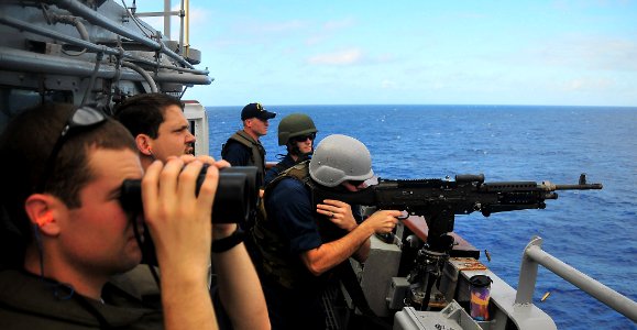 US Navy 090129-N-4774B-035 Sailors aboard the guided-missile cruiser USS Lake Champlain (CG 57) conduct a live-fire exercise with the ship's .50-caliber machine guns