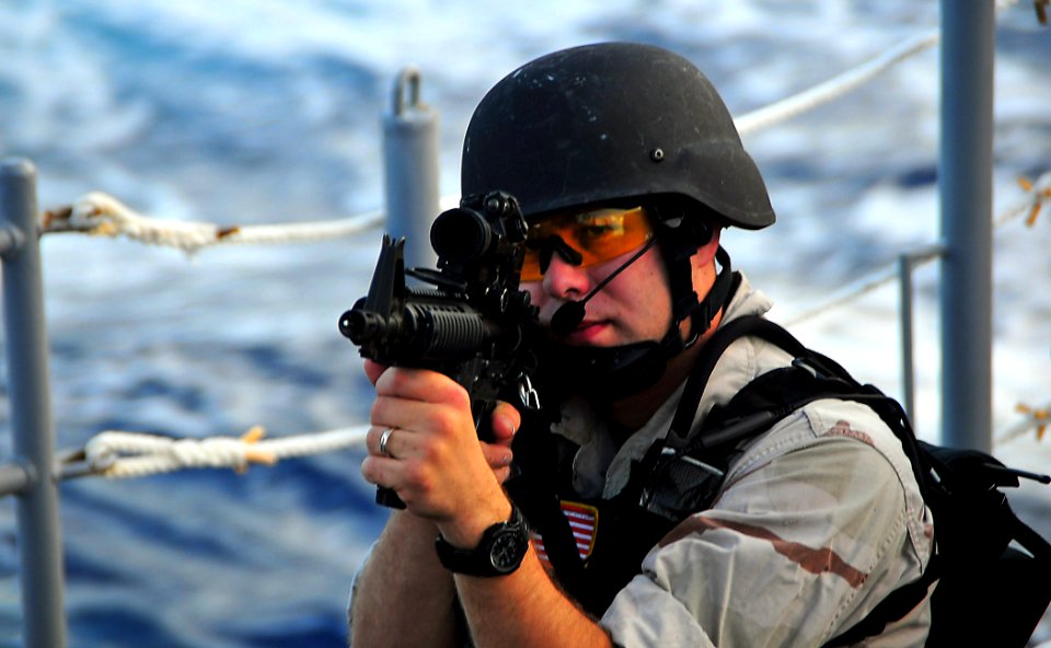 US Navy 090127-N-4774B-030 A Sailor aboard the guided-missile cruiser USS Lake Champlain (CG 57) rehearses weapon procedures during a visit, board, search, and seizure exercise