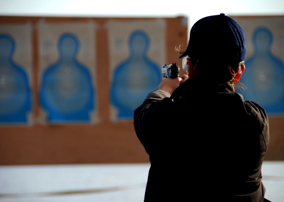 US Navy 090131-N-4044H-022 Operations Specialist Seaman Apprentice Tatiana Medina participates in 9mm small-arms qualifications and re-qualifications aboard the amphibious command ship USS Mount Whitney (LCC 20)