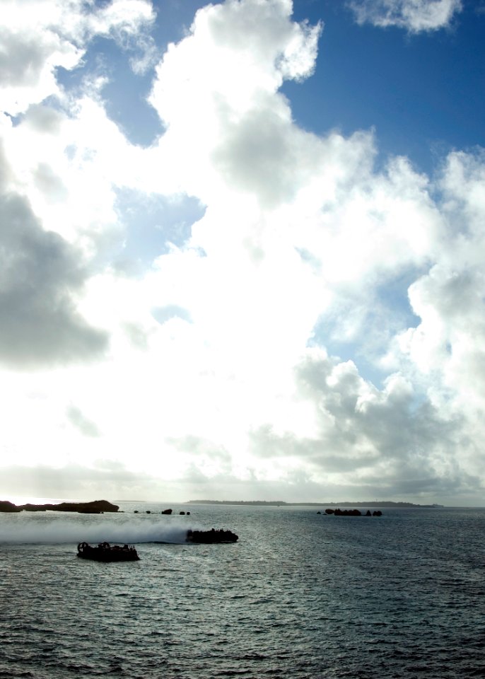 US Navy 090129-N-1251W-001 Landing craft air cushion (LCAC) craft assigned to Assault Craft Unit (ACU) 5, transport members of the 31st Marine Expeditionary Unit near Okinawa, Japan
