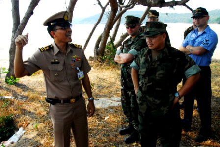 US Navy 090203-N-7843A-081 A Royal Thai Navy officer describes the plan for the Cobra Gold 2009 to Lt. Cmdr. Ron Mangsat and other members of Task Force 76 photo