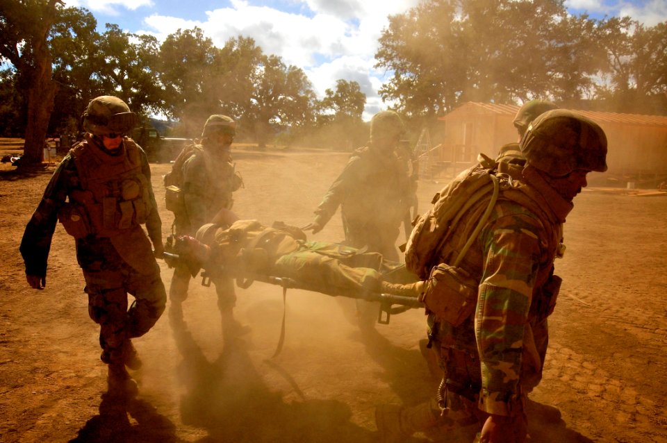 US Navy 111004-N-SM578-063 Seabees assigned to Naval Mobile Construction Battalion (NMCB) 40 conduct a mass casualty drill at Fort Hunter Liggett