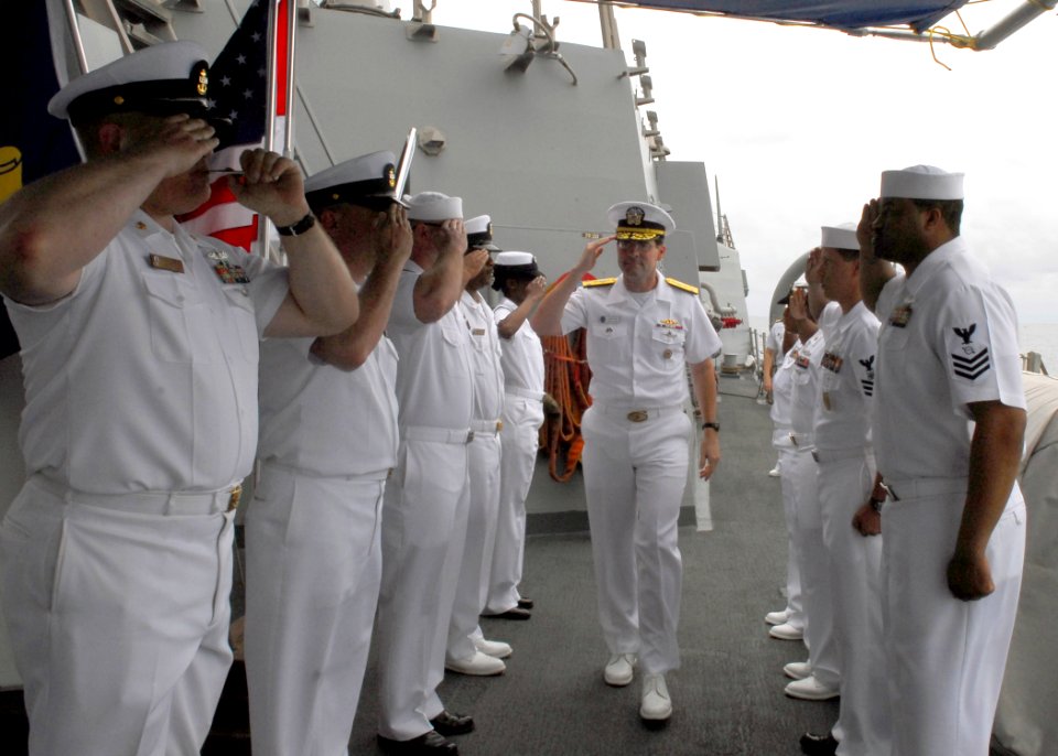 US Navy 090131-N-2013O-009 Sailors assigned to the Arleigh Burke-class guided-missile destroyer USS Lassen (DDG 82) render honors for Vice Adm. John M. Bird, commander, U.S. 7 Fleet
