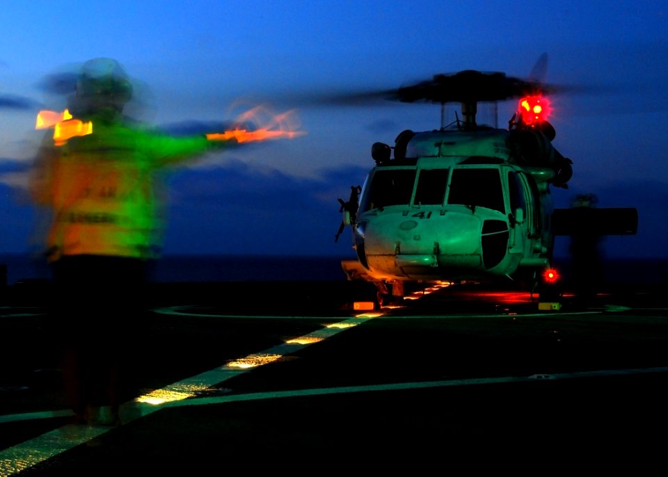 US Navy 090131-N-4044H-042 An MH-60 Sea Hawk helicopter assigned to Helicopter Sea Combat Squadron (HSC) 28 lands aboard the amphibious command ship USS Mount Whitney (LCC 20)