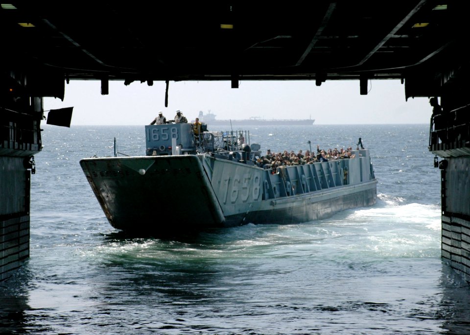 US Navy 090203-N-1655H-047 A landing craft utility motors out of the well deck of USS Nashville (LPD 13)