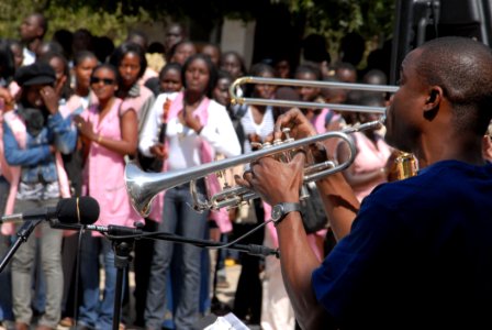 US Navy 090204-N-1688B-225 Musician 2nd Class Antonio Rice plays the trumpet for students of Lycee Abdoulaye photo