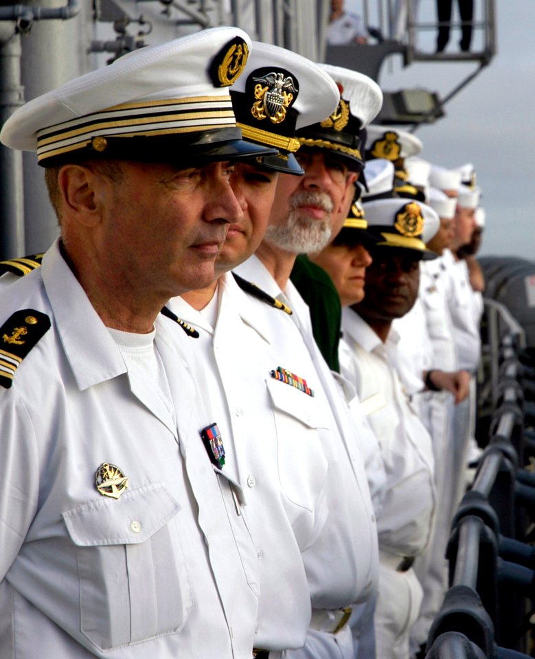 US Navy 090203-N-3316L-077 French Navy Cmdr. Denis Jolas and Sailors man the rails of USS Nashville (LPD 13)