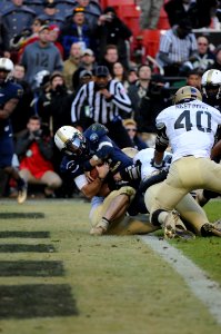 US Navy 111210-N-OA833-949 U.S. Naval Academy quarterback (^2) Kriss Proctor scores a touchdown during the 112th Army-Navy Football game at FedEx F