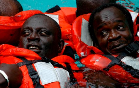 US Navy 090205-N-1655H-516 Senegalese fisheries water survival training participants practice group survival-at-sea skills. Africa Partnership Station and the National Oceanic and Atmospheric Administration photo