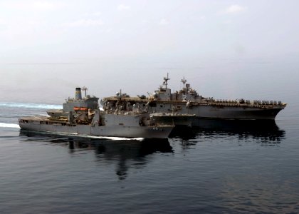 US Navy 090206-N-5253W-127 USS Tortuga (LSD 46) and USS Essex (LHD 2) receive fuel from USNS Rappahannock (T-AO 204)