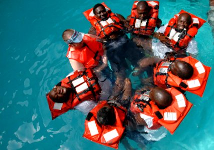 US Navy 090205-N-1655H-476 John LaFargue conducts water survival training with Senegalese marine biologists photo