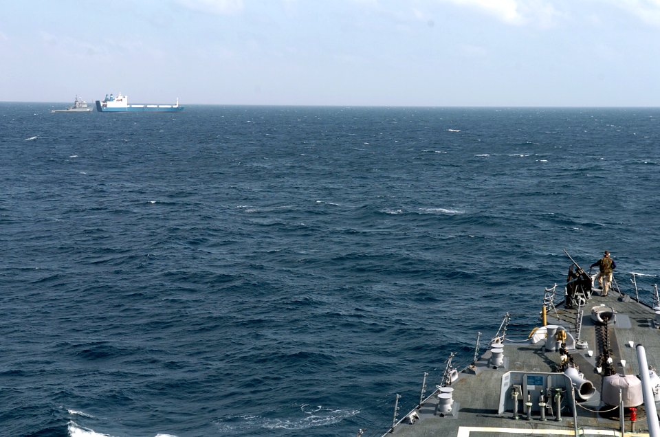 US Navy 090206-N-3931M-158 A watch stander on the bow of USS Mahan (DDG 87) monitors the fleet ocean tug USNS Catawba (T-ATF 168) as it makes preparations to transfer provides fuel and fresh water to Motor Vessel Faina
