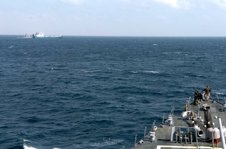 US Navy 090206-N-3931M-158 A watch stander on the bow of USS Mahan (DDG 87) monitors the fleet ocean tug USNS Catawba (T-ATF 168) as it makes preparations to transfer provides fuel and fresh water to Motor Vessel Faina
