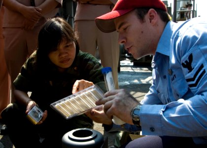US Navy 090209-N-1251W-047 Damage Controlman 2nd Class Max Kehl, assigned to the amphibious dock landing ship USS Harpers Ferry (LSD 49) explains chemical, biological, and radiological (CBR) detection procedures to Lt. Cmdr. Ra