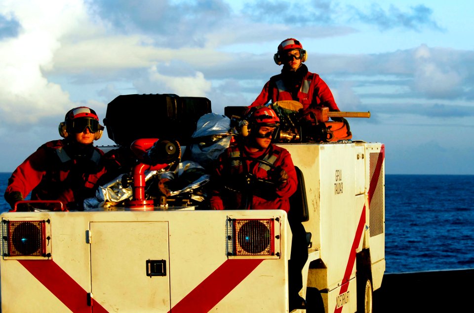 US Navy 090205-N-6538W-185 Sailors man a P-25 flight deck fire fighting truc