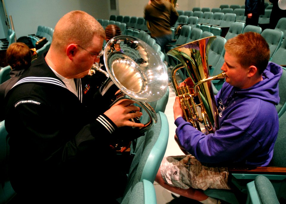 US Navy 090205-N-4649C-002 Musician 2nd Class Eric Cavender shows Rax Wilson warm up techniques at Naval Base Kitsap Keyport Naval Undersea Museum