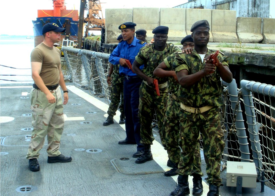 US Navy 090209-N-9849P-046 Fire Controlman 2nd Class Chris Hann trains Mozambique Marines aboard the the guided-missile frigate USS Robert G. Bradley (FFG 49)