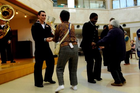 US Navy 090207-N-3830J-098 Sailors assigned to the amphibious command ship USS Blue Ridge (LCC 19) and commander, U.S. 7th Fleet staff Sailors dance with senior citizens